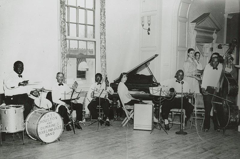 Drummer Matthew “Fats” Houston, far left, plays with Houston and Dumaine Dixieland Jazz Band in the University College Building at Tulane circa 1945. 