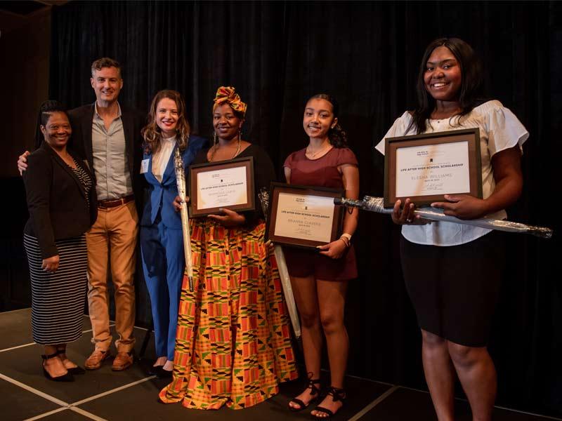 The Cowen Institute received a $250,000 grant from the philanthropic foundation Carnegie Corporation of New York to launch and expand the New Orleans College & Career Attainment Network. Funding will also support the annual one-day Life After High School convening on postsecondary readiness and success. (Pictured from left to right) Alida Murray, Upward Bound college counselor; John White, former Louisiana State Superintendent of Education; Amanda Kruger Hill, Cowen Institute executive director; present sch