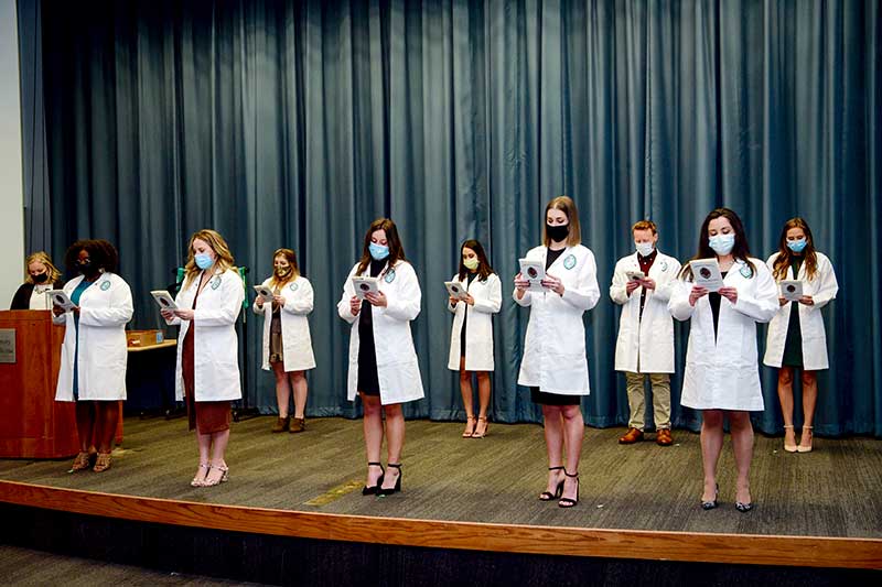 Students read the Oath of the Pathologists’ Assistant Program
