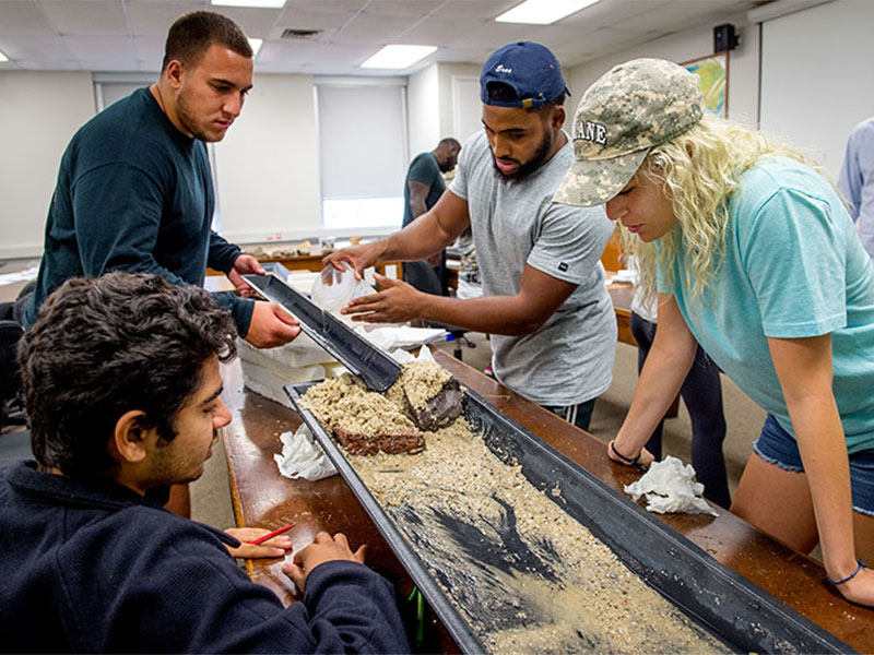 Students in Physical Geology Lab explore how water creates various landforms, like stream channels and deltas, through erosion, transport, and deposition of sediment.