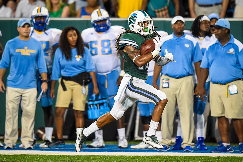Tulane cornerback Parry Nickerson runs back an interception 96 yards for a touchdown in the first quarter of the Green Wave’s game against Southern University on Saturday (Sept. 10).