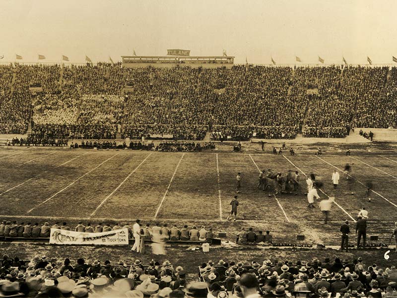 The Tulane Green Wave hosts a packed house for a game versus the LSU Tigers in the early days of the old Tulane Stadium circa 1930. 