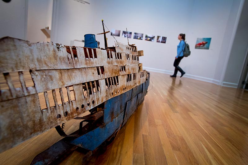 Kristian Murina’s Three Bloody Letter Ship (2015) sits in the center of the main room of the Carroll Gallery in the Woldenberg Art Center. An iron shipwreck is center stage in the Newcomb Art Department’s undergraduate juried exhibition.