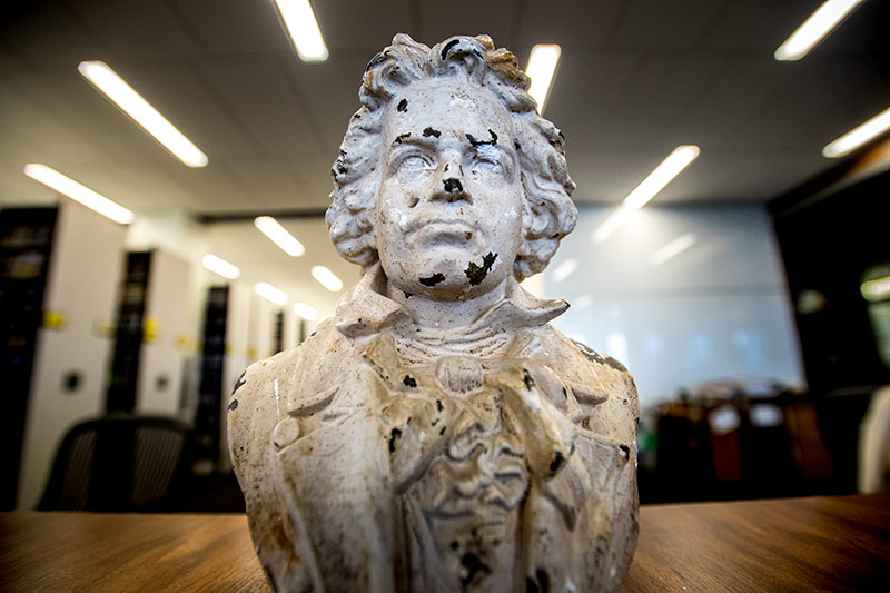 An iron bust of Ludwig Von Beethoven sits on the counter of the Media Services collection on the sixth floor of the Howard-Tilton Memorial Library.