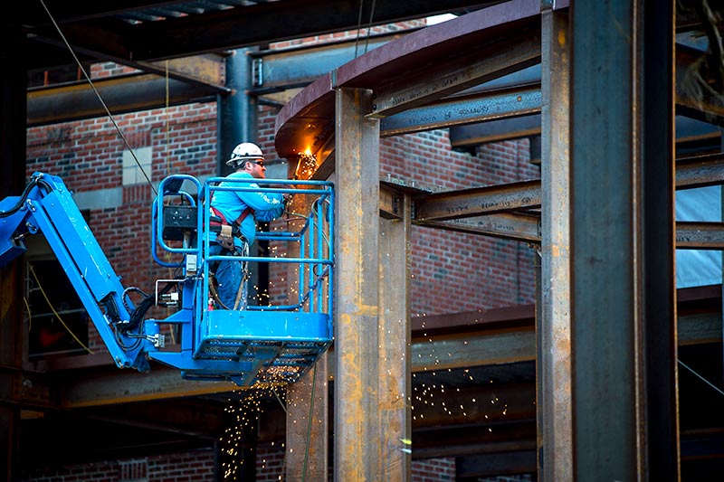 Sparks fly as the A.B. Freeman School of Business expansion rolls along. Sparks fly as the A.B. Freeman School of Business expansion rolls along.