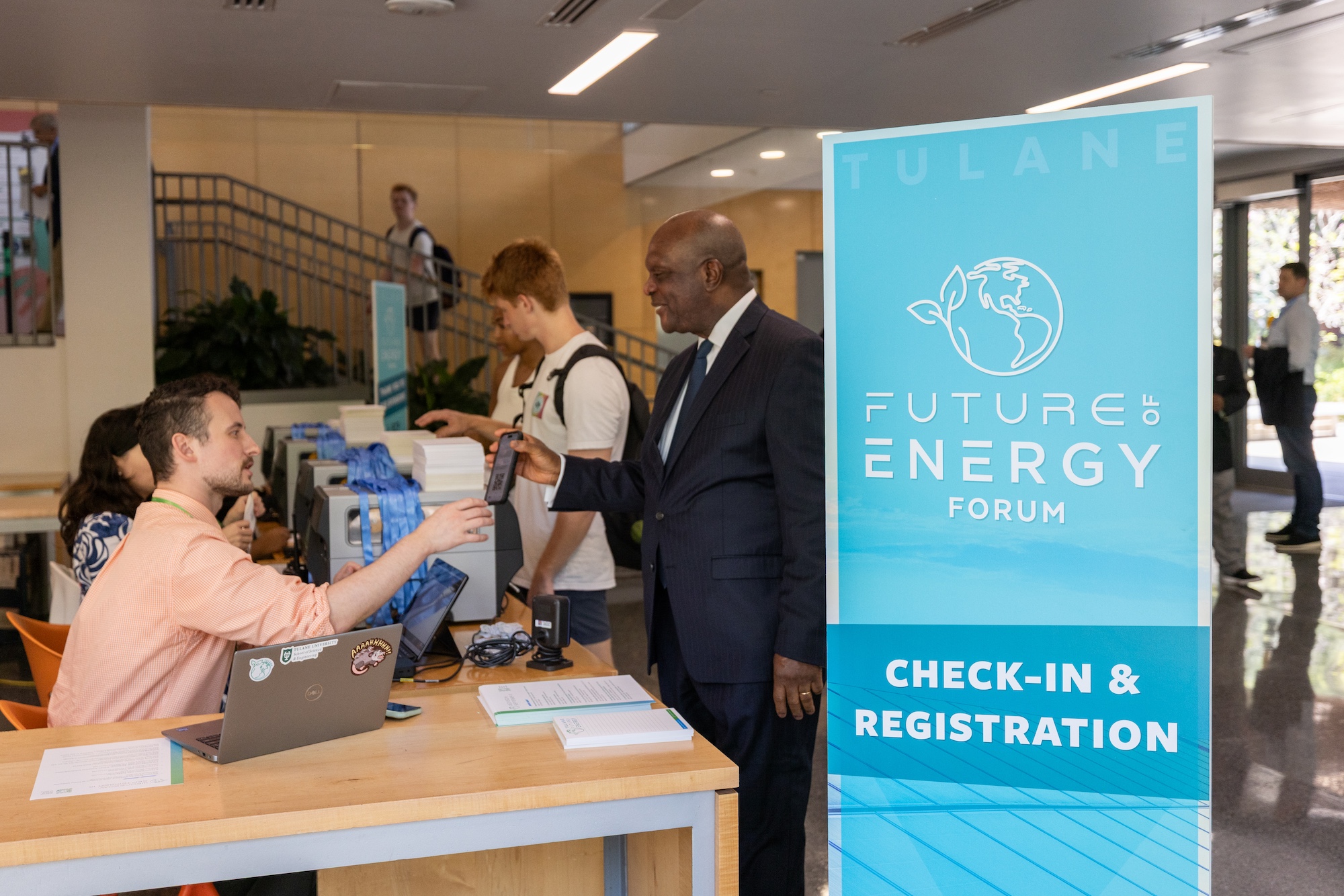 Guests check in at the Forum
