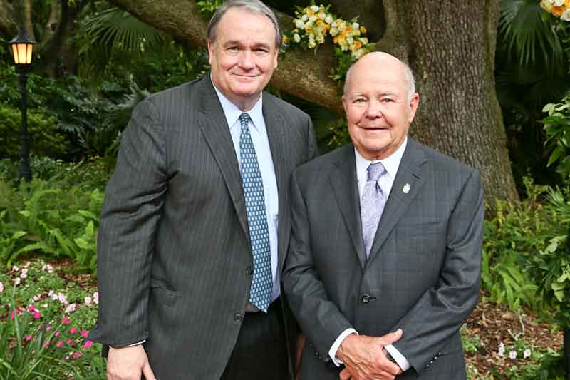 President Michael Fitts and Walter Blessey