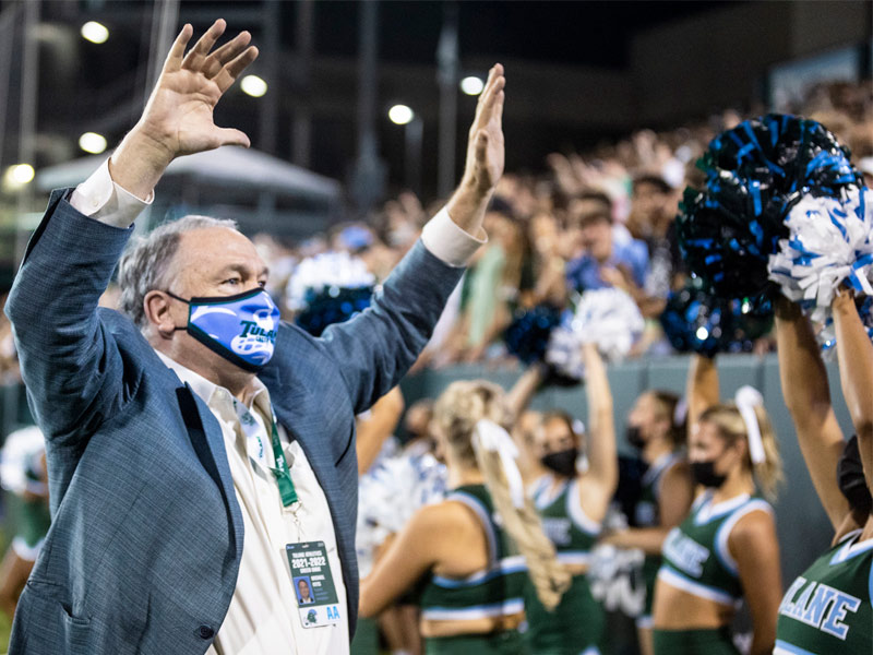 Tulane President Michael Fitts welcomes students back to Yulman Stadium during the game. 