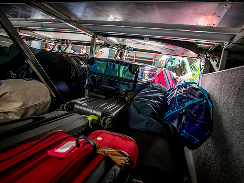 Students’ belongings loaded in the bay of one of the buses. Students were asked to bring two pieces of luggage, along with their laptops and any valuables.