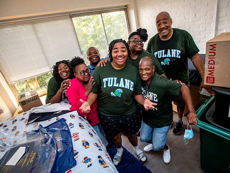 At Sharp Residence Hall, move-in day is an extended-family affair for first-year student Vakaya Lee, center, surrounded by her parents, aunts and uncle.