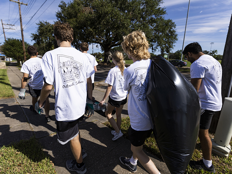 Students clean up along Press Drive in the Pontchartrain Park subdivision.