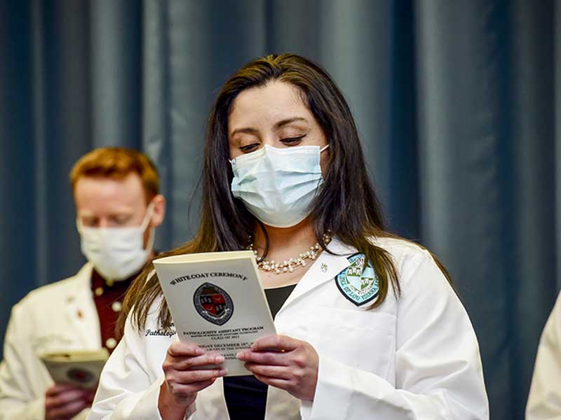 Daniela Rodriguez reads the Oath of the Pathologists’ Assistant Program