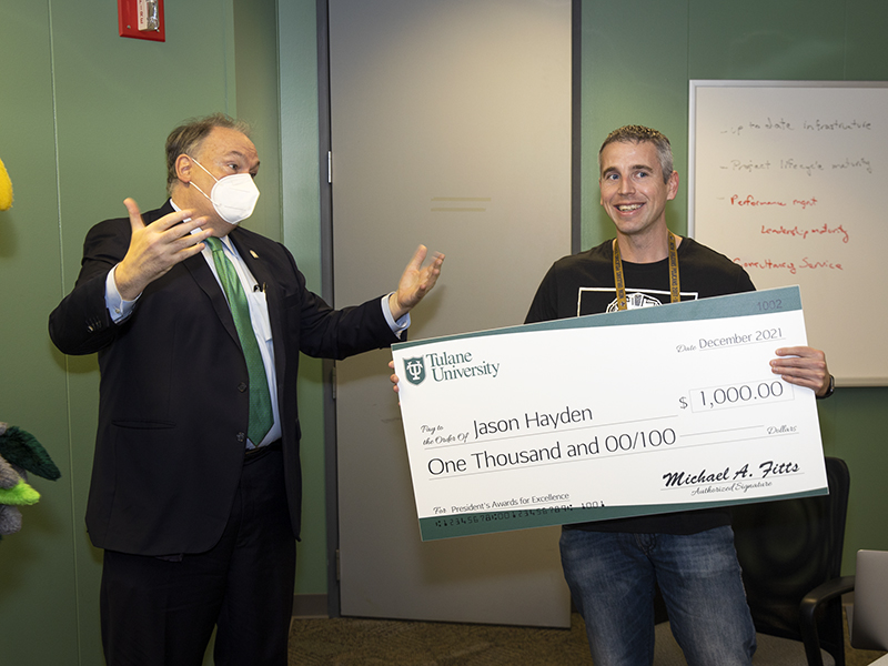 Jason Hayden, executive director of IT Operations Technology Services, is all smiles upon receiving his award. 