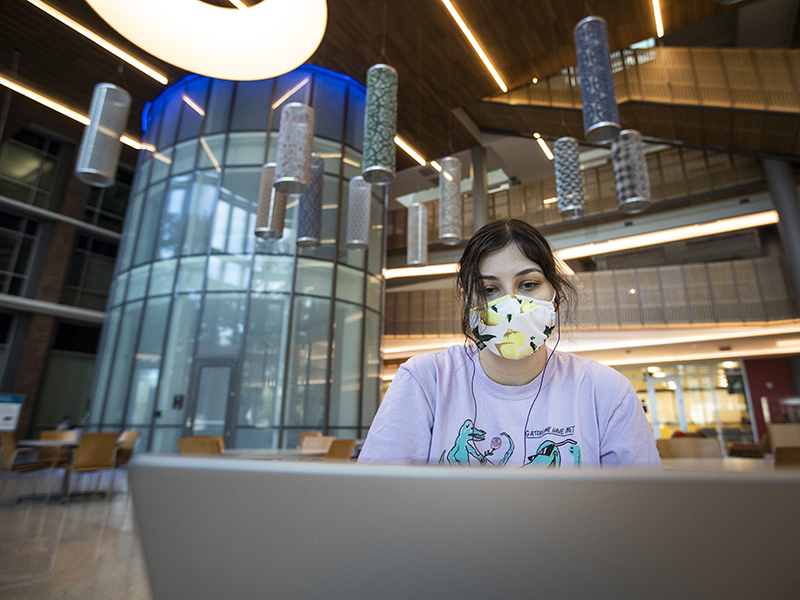 Jeannie Smith, a JD/MBA student, works inside the Goldring/Woldenberg Business Complex.