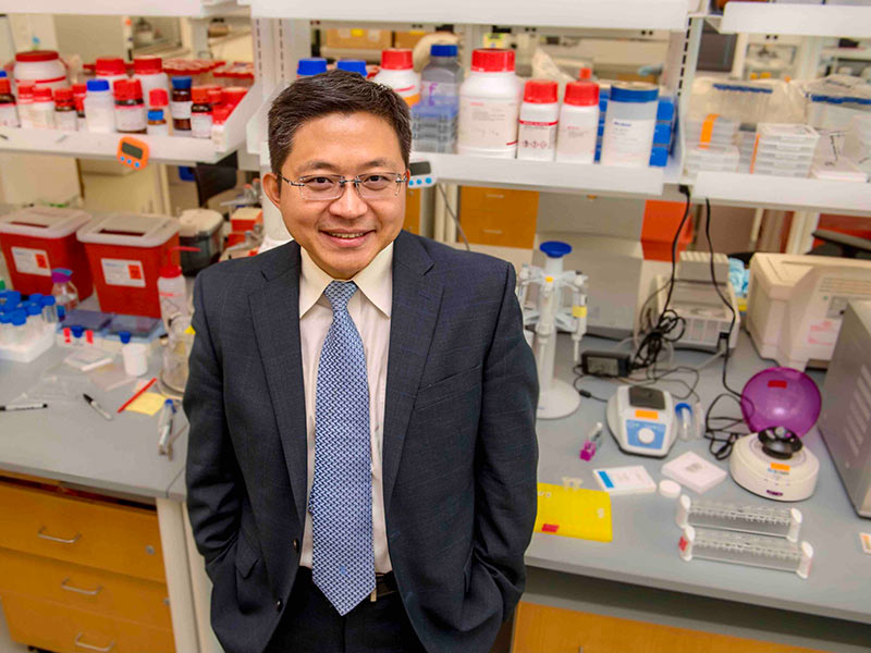 Dr. Tony Hu in a lab