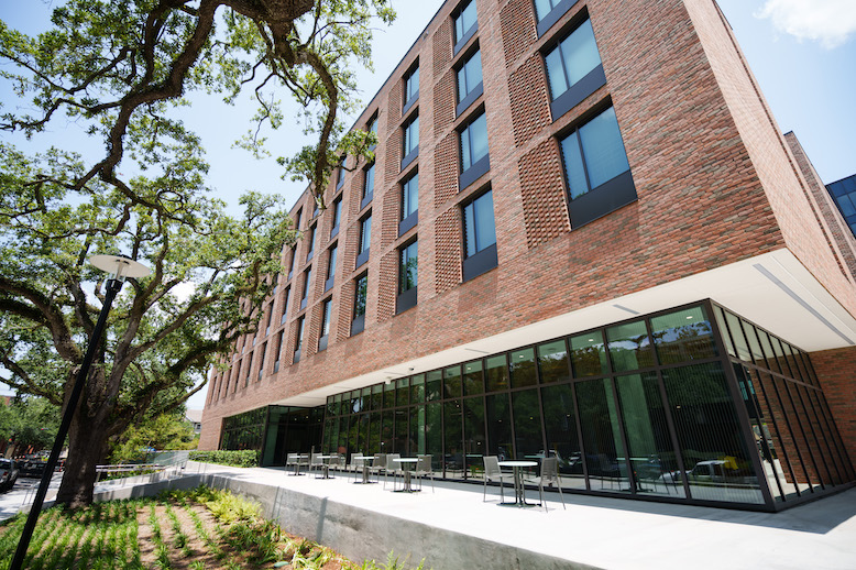 Brick exterior and patio of new River and Lake Residence Halls