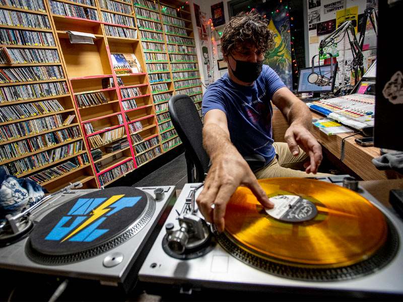 WTUL disc jockey John Petry, Tulane alumnus, gears up for his weekly eclectic progressive music show broadcast from the basement of the Lavin-Bernick Center every Tuesday morning. Petry became a DJ at the station in 1993, his freshman year.