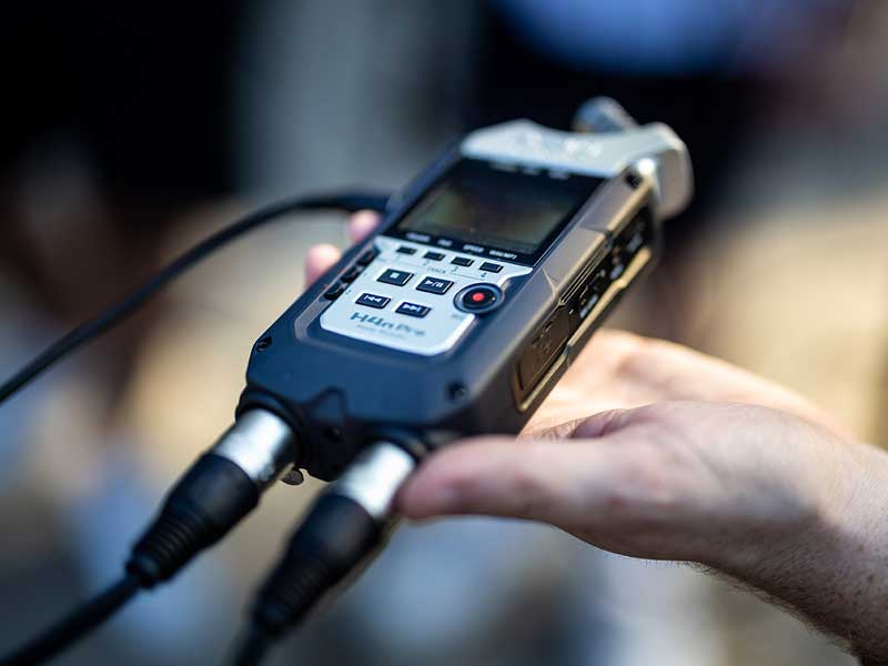 Sounds from Audubon Park are recorded to an SD card using a recorder.