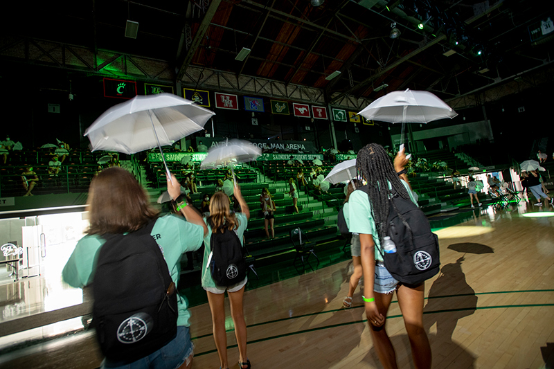 With second-line umbrellas bouncing, New Student Orientation Leaders (aka Wave Leaders) set the tone for the semester ahead as t
