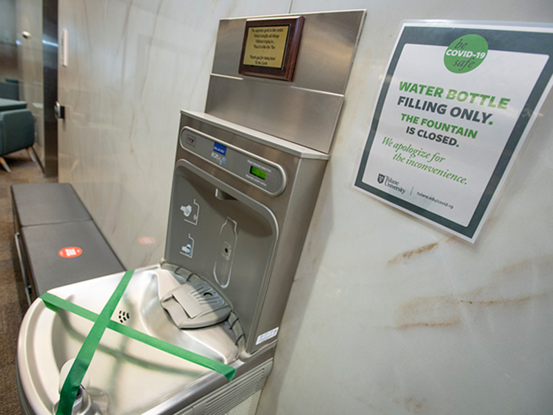 Water bottle filling stations and water fountains have been taped off. (Photo by Paula-Burch Celentano)
