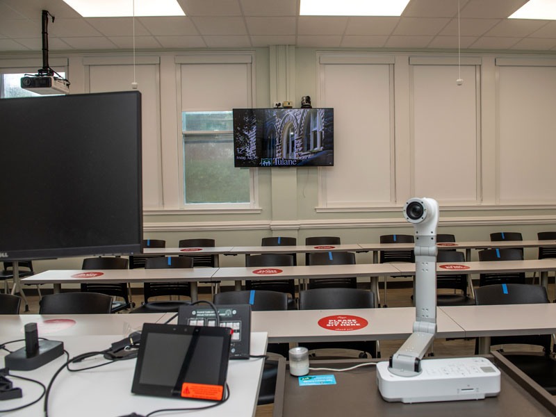 In Norman Mayer Memorial Hall, a document camera is part of the classroom technology setup.
