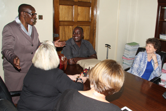 Sally J. Kenney meets with colleagues in Kenya