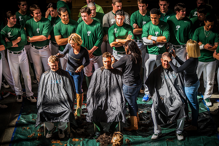 Baseball team shaves heads for charity 