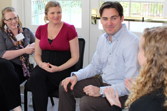 Trauma expert George Faller works with a group of therapists.