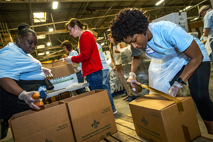 Hundreds of Tulane employees volunteer during the annual Wave of Green. 