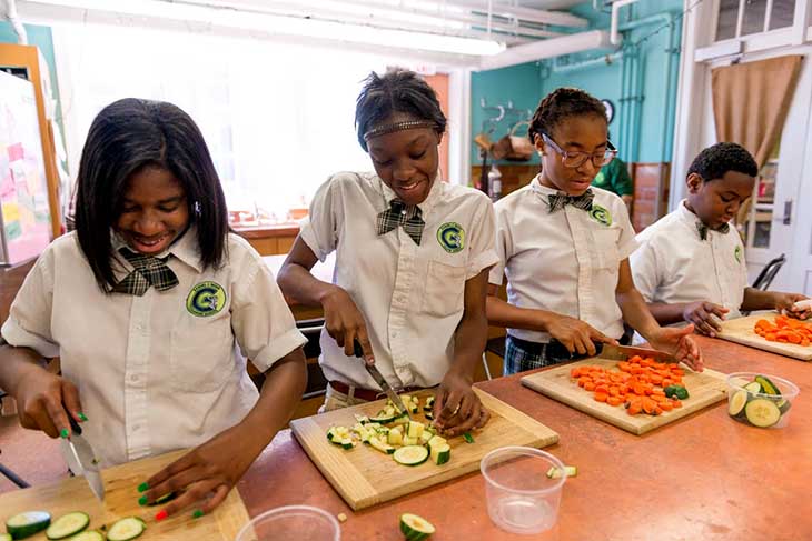 Charter school students learn kitchen skills Charter school students learn kitchen skills