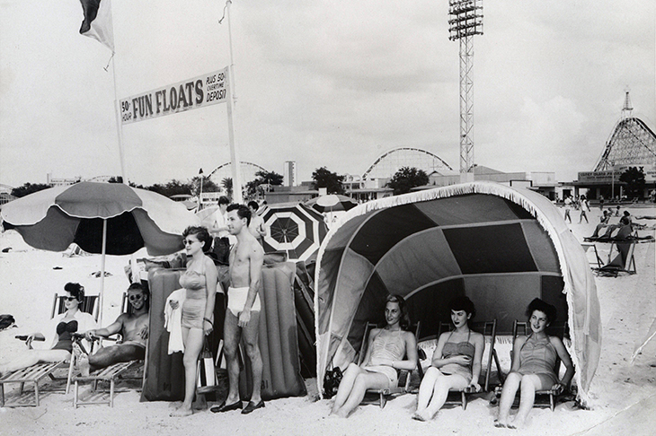Sunbathers relax along the south shore of Lake Pontchartrain.