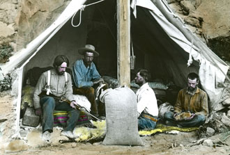This image, Leisure Time at George Pepper's Tent, is part of the new museum exhibit. (Hand-colored glass lantern slides courtesy of Tulane University's Middle American Research Institute.)