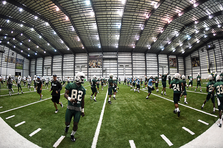 Green Wave football gets down to business.