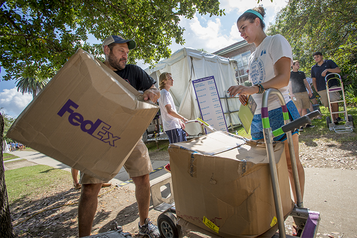 First-year students and their families descend on the uptown campus during move-in day.