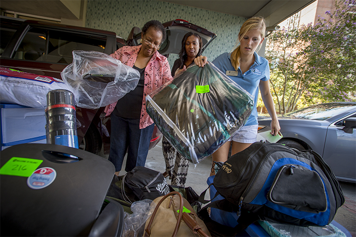 First-year students and their families descend on the uptown campus during move-in day. First-year students and their families descend on the uptown campus during move-in day.
