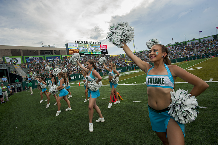 Spirits are high during the first game in Yulman Stadium.