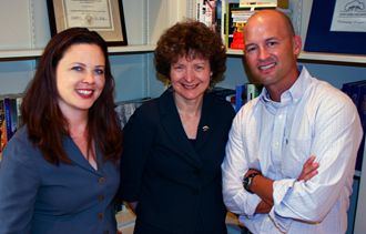 Sally Kenney, Fred Buttell and Tania Tetlow teach undergrads the sobering facts on domestic violence.