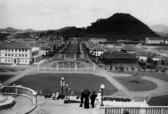 This 1919 photograph shows Fourth of July decorations on the Prado, the administrative center of the town of Balboa, located at the Pacific entrance to the Panama Canal. 