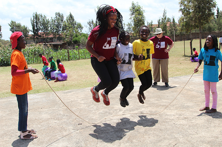 Malliron Hodge, assistant director for student leadership and engagement of Newcomb College Institute, plays jump rope with children at Ngong Road Children Malliron Hodge, assistant director for student leadership and engagement of Newcomb College Institute, plays jump rope with children at Ngong Road Children