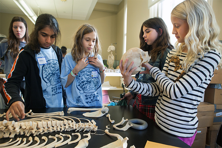 Middle-school girls in the Tulane GIST (Girls in STEM) program interact at the New Life in Buried Bones workshop