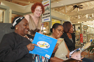 Social Work professor Marva Lewis at a book donation for the Early Connections Project