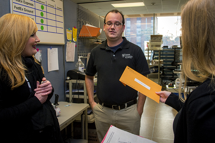 President Fitts honors outstanding staff.