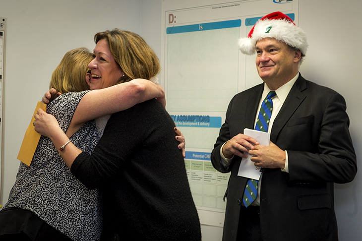 President Fitts honors outstanding staff.