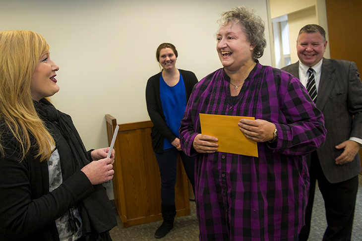 President Fitts honors outstanding staff.