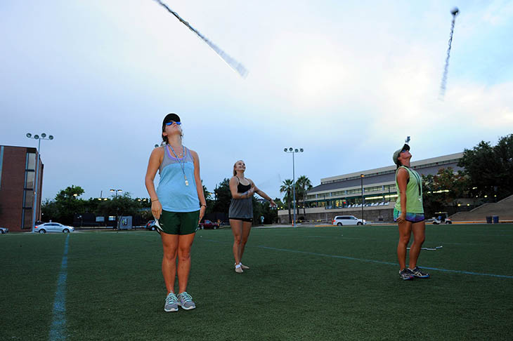 Tulane University Marching Band drum major Lauren Stevens, featured twirler Erin Ketterman and drum major Liz King