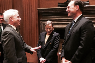 David Meyer, left, chats with Justices Ruth Bader Ginsburg and Samuel Alito