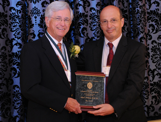 Dr. John T. Wilson and Dr. Benjamin Sachs