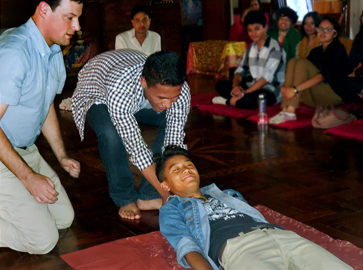 Through the Tulane Global Trauma Education Program, a Nepali mountaineer learns how to do a safe movement (“clothes drag”) with a colleague in Kathmandu, Nepal. Through the Tulane Global Trauma Education Program, a Nepali mountaineer learns how to do a safe movement (“clothes drag”) with a colleague in Kathmandu, Nepal.