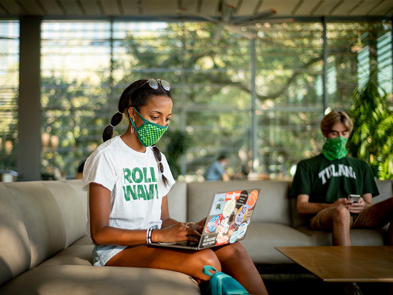 Masked students on campus Masked students on campus