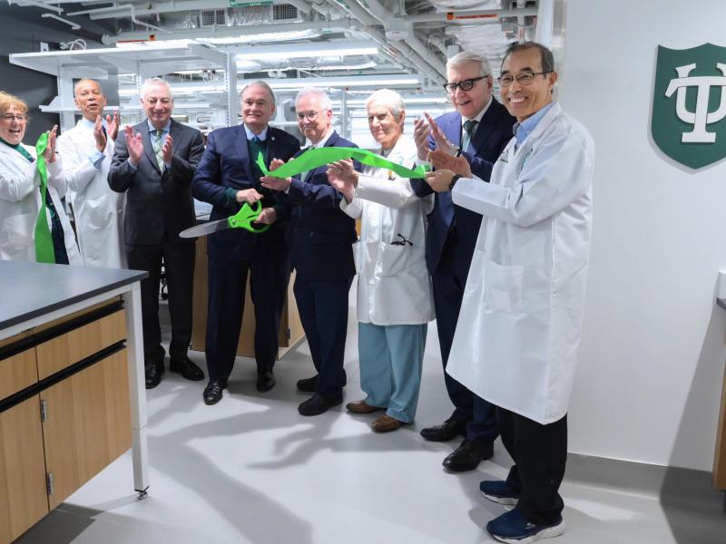 Tulane President Michael A. Fitts with top university leaders at the Hutchinson Memorial Building ribbon cutting